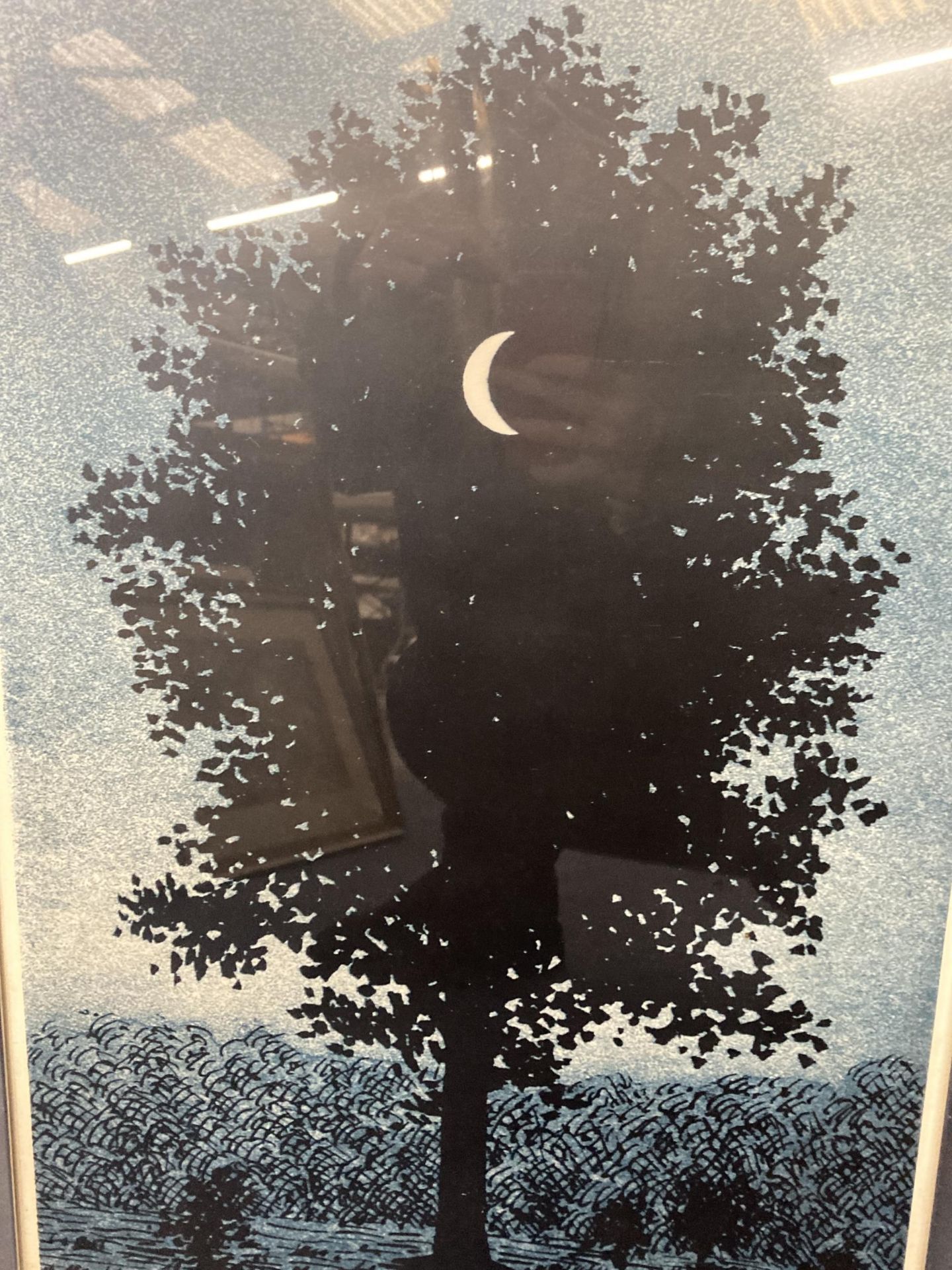 A FRAMED MAGRITTE PRINT OF A SUPERIMPOSED CRESCENT MOON IN FRONT OF A TREE, TITLED LE SEIZE - Image 2 of 3