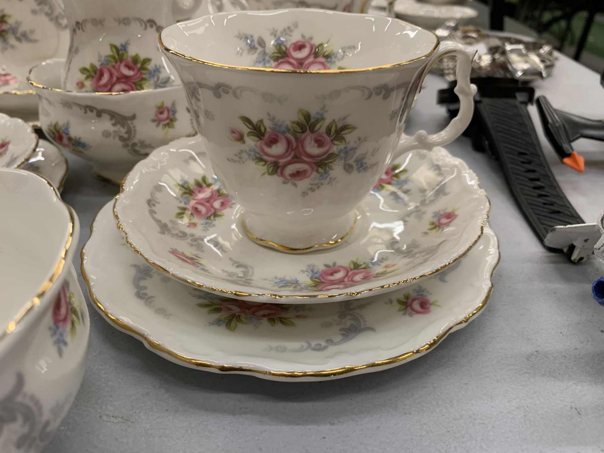 A ROYAL ALBERT 'TRANQUILITY' TEASET TO INCLUDE CUPS, SAUCERS, SIDE PLATES, TWO CREAM JUGS AND A - Image 2 of 5