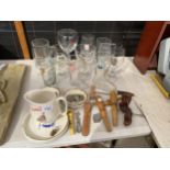 AN ASSORTMENT OF VINTAGE BREWERY ITEMS TO INCLUDE A FAMOUS GROUSE JUG, BRANDED GLASSES AND ASH TRAYS