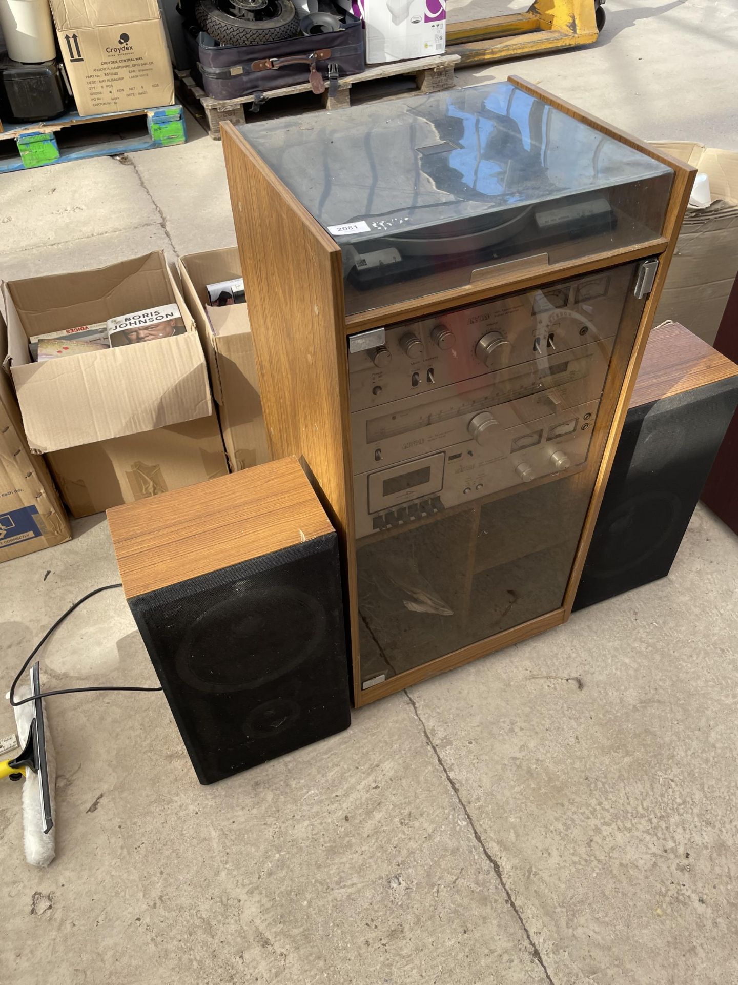 A TEAK STEREO CABINET WITH AMSTRAD AMPLIFIER, CASSETTE DECK AND RECORD PLAYER TO ALSO INCLUDE TWO