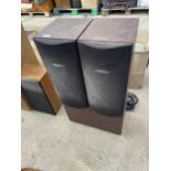 A PAIR OF TALL WOODEN CELESTRON SPEAKERS