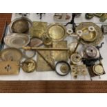 A LARGE QUANTITY OF ITEMS TO INCLUDE BRASS PLAQUES, PLATES, BOWLS, CANDLEABRA, SERVING DISHES,