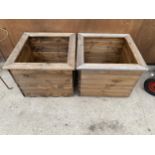 TWO LARGE WOODEN PLANTERS HEIGHT 46CM, WIDTH 57CM, DEPTH 57CM - NO VAT