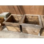 TWO LARGE WOODEN PLANTERS HEIGHT 46CM, WIDTH 57CM, DEPTH 57CM - NO VAT