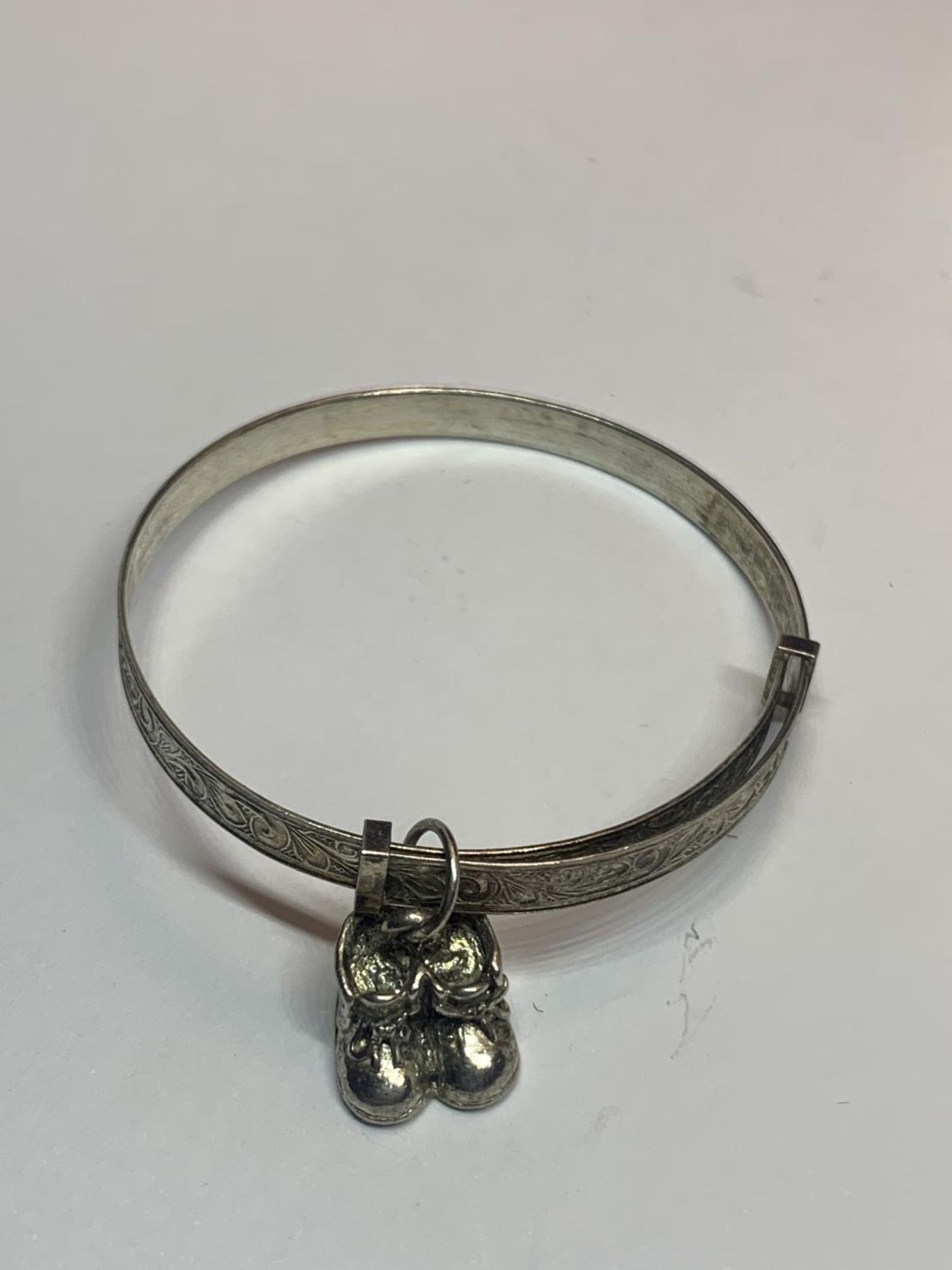 TWO SILVER BANGLES TO INCLUDE A CHILDS WITH CHARMS - Image 2 of 3