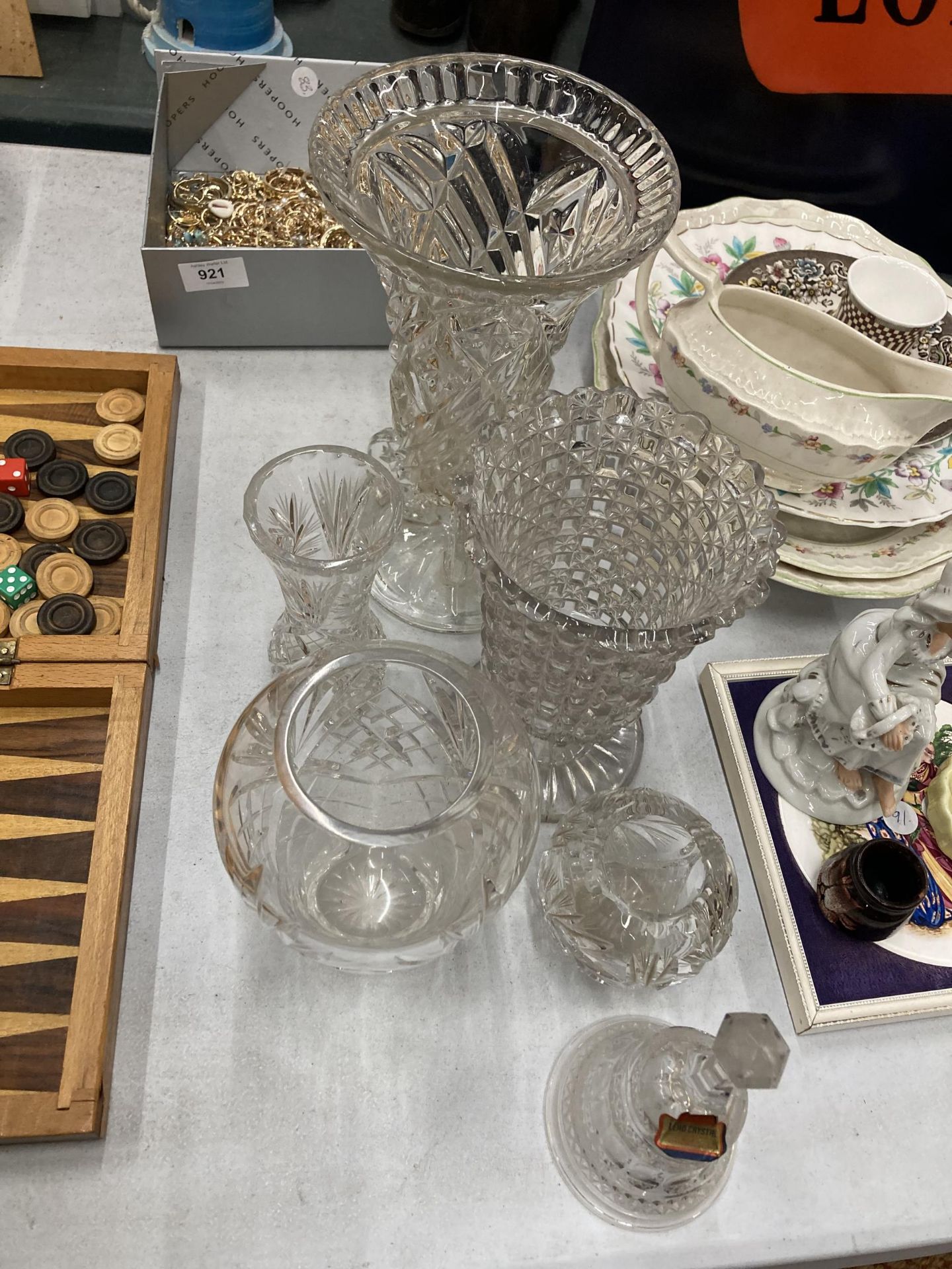 A QUANTITY OF CUT GLASS ITEMS TO INCLUDE VASES AND A BELL