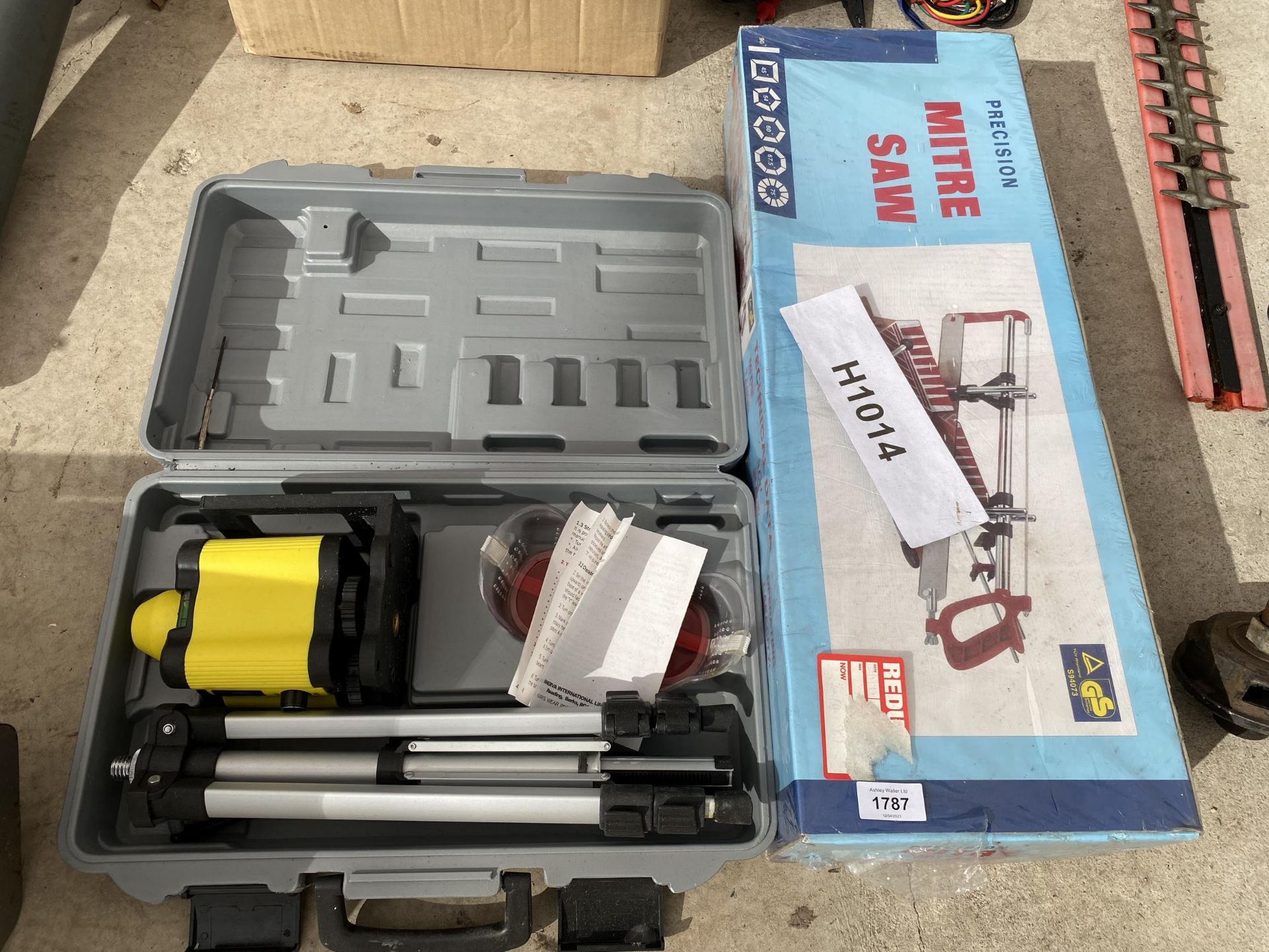 A LASER LEVEL KIT AND A MITRE SAW