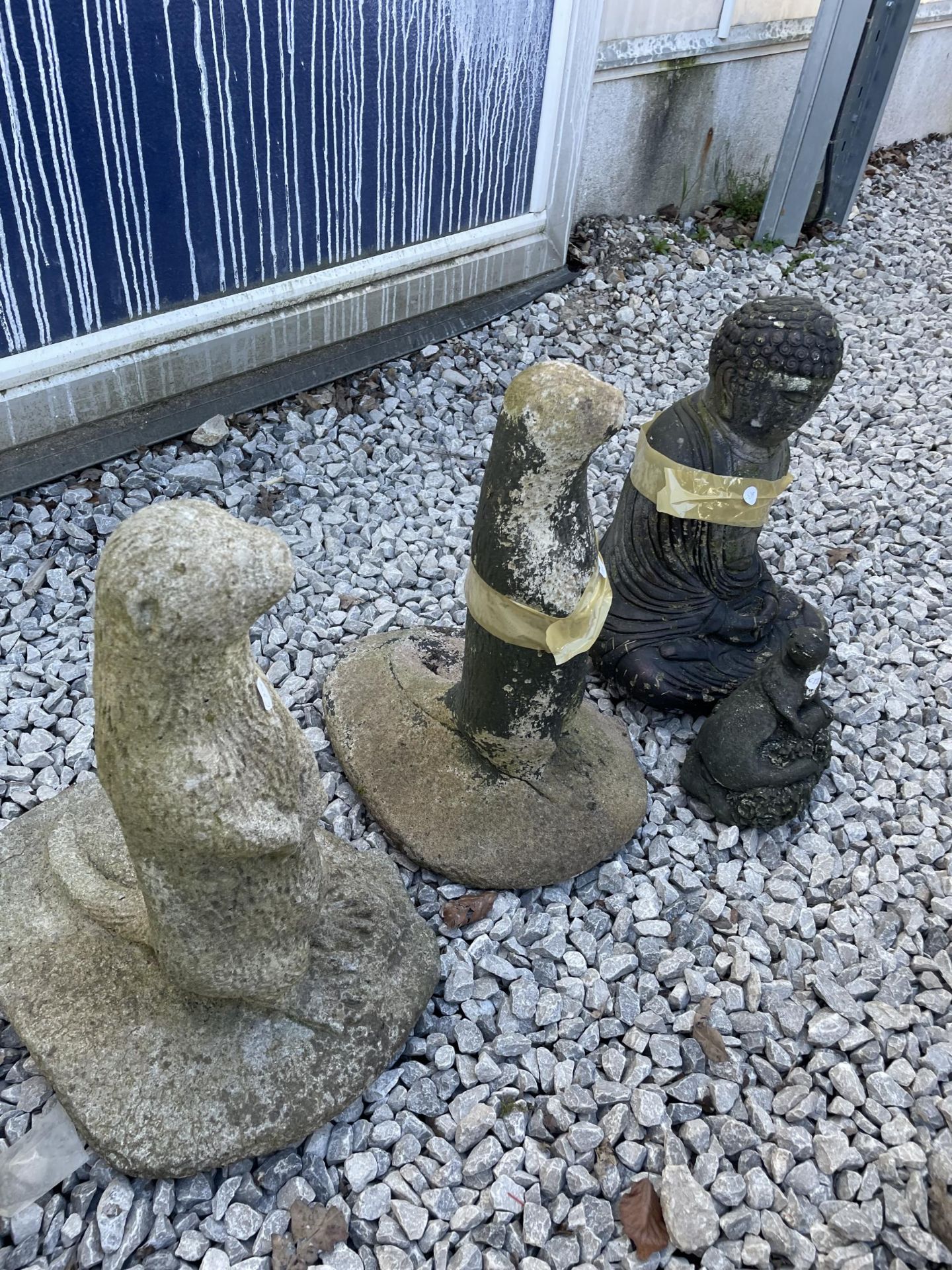 FIVE LARGE RECONSTITUTED STONE GARDEN FIGURES TO INCLUDE OTTERS AND A BUDDHA ETC - Image 2 of 3