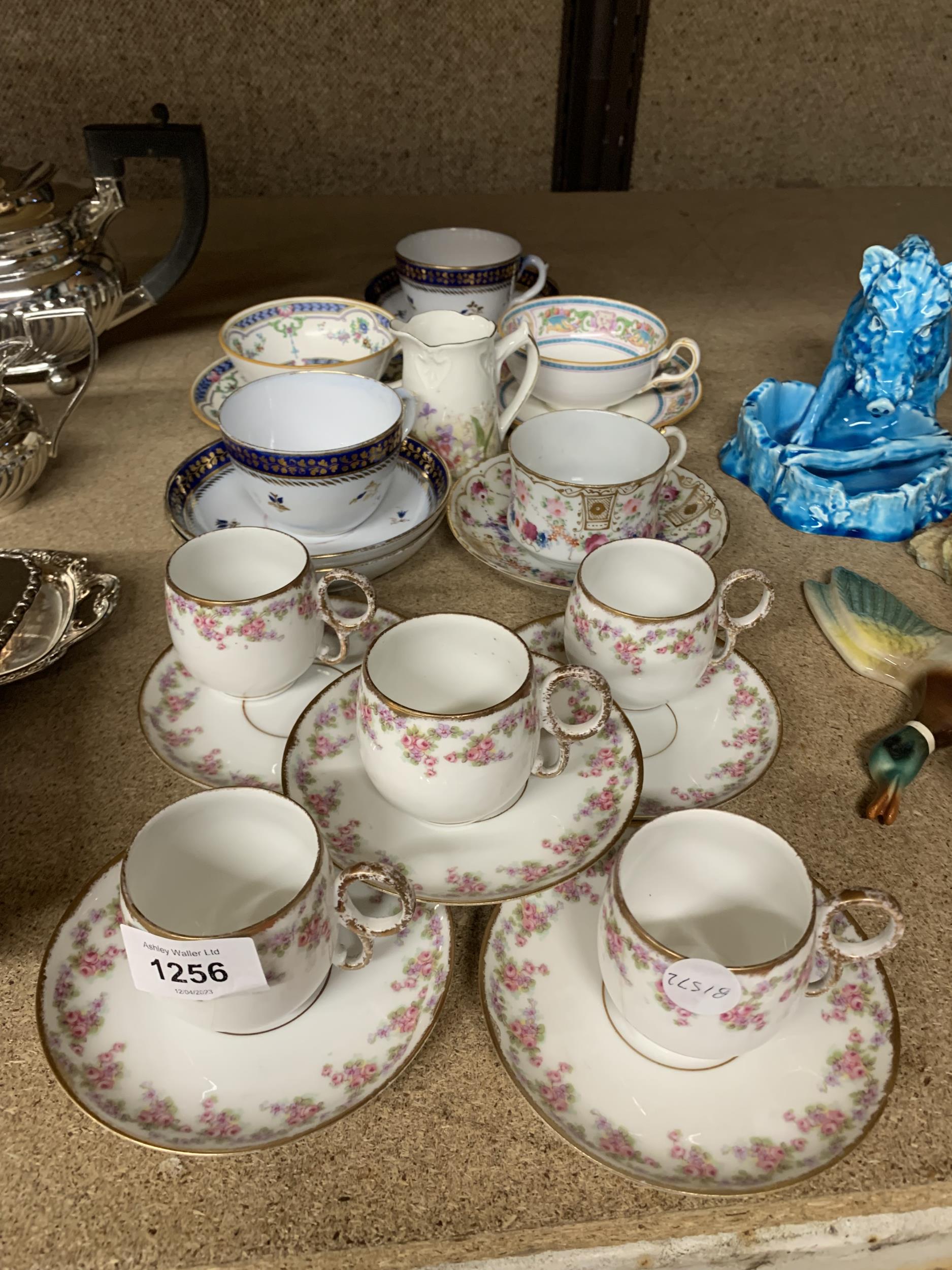 A QUANTITY OF CUPS AND SAUCERS TO INCLUDE LIMOGES AND MINTON