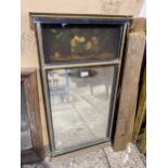 A VINTAGE GILT AND EBONISED MIRROR WITH STILL LIFE PAINTED SCENE