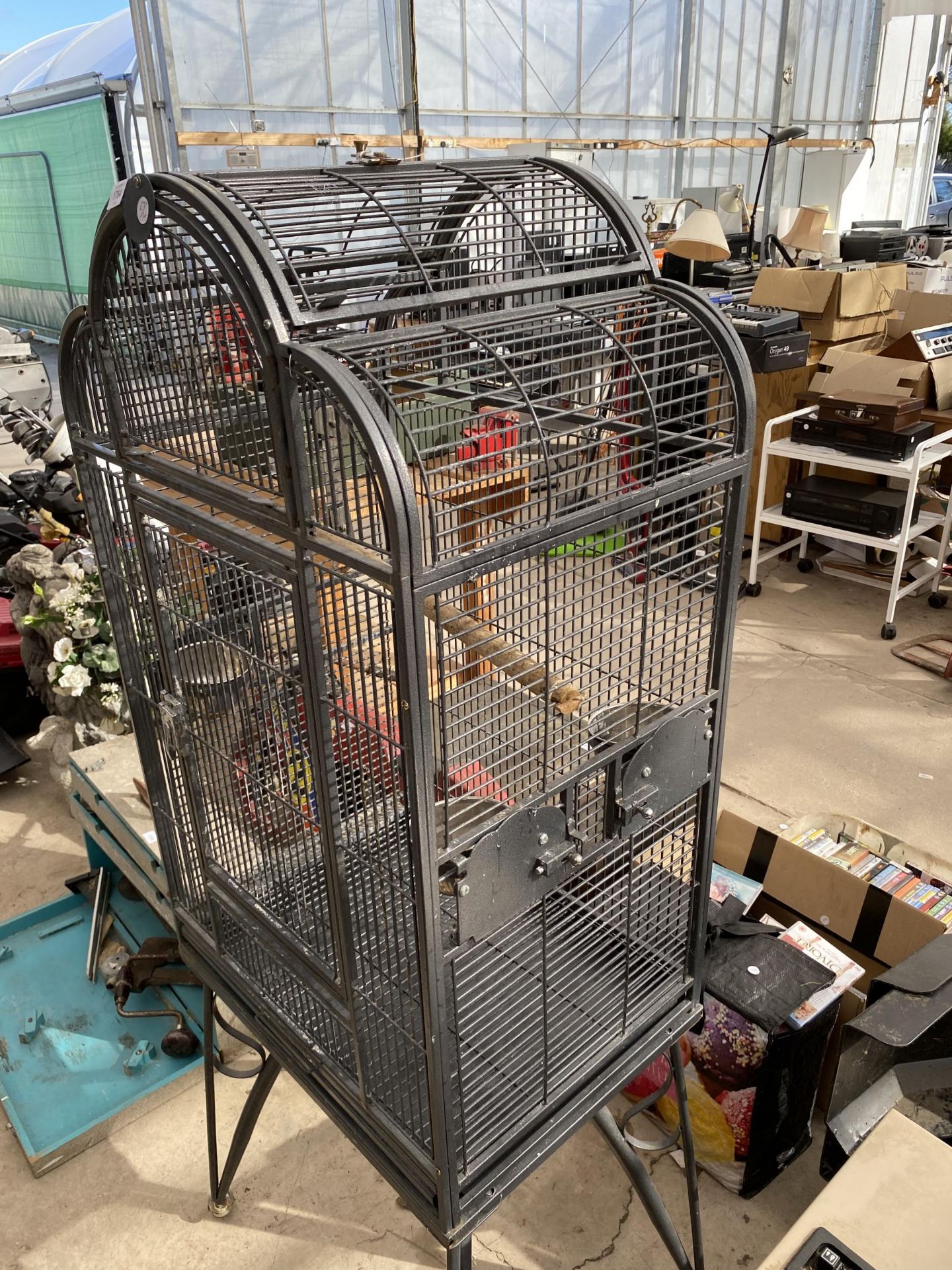 A LARGE METAL PARROT CAGE ON WHEELED BASE - Image 2 of 3