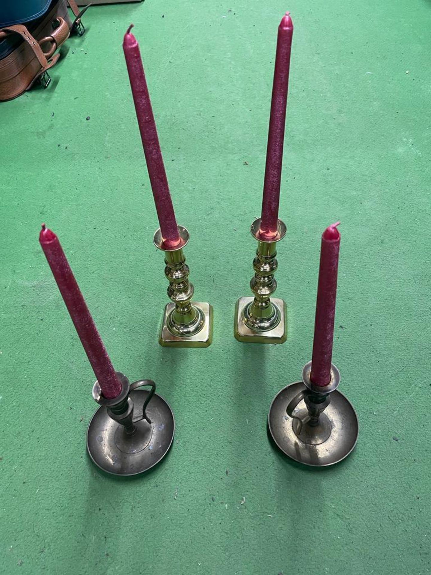 TWO PAIRS OF VINTAGE BRASS CANDLESTICKS WITH CANDLES