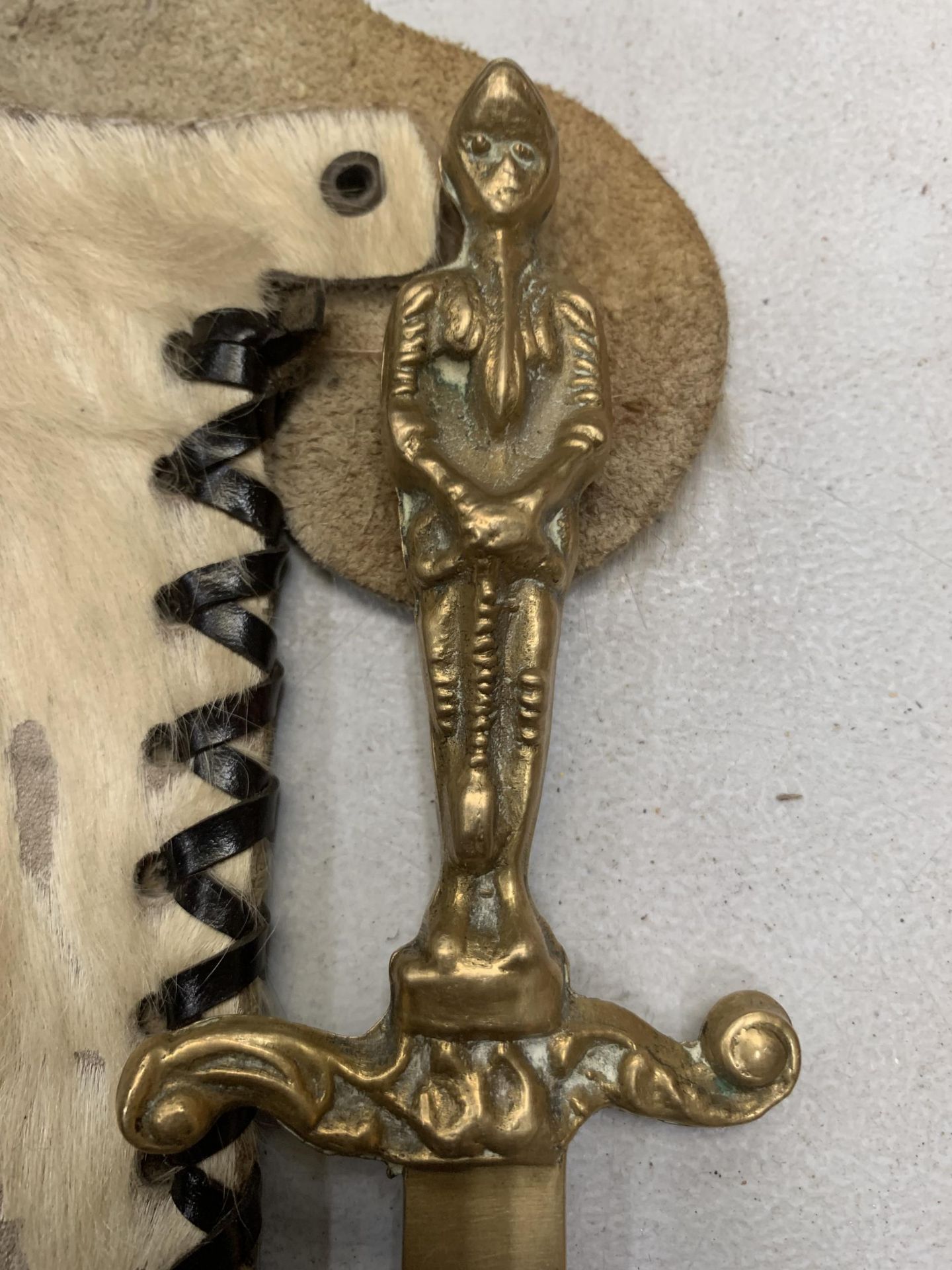 AN ORNATE KNIFE IN AN ANIMAL SKIN SHEATH AND A BRASS LETTER OPENER - Image 2 of 4