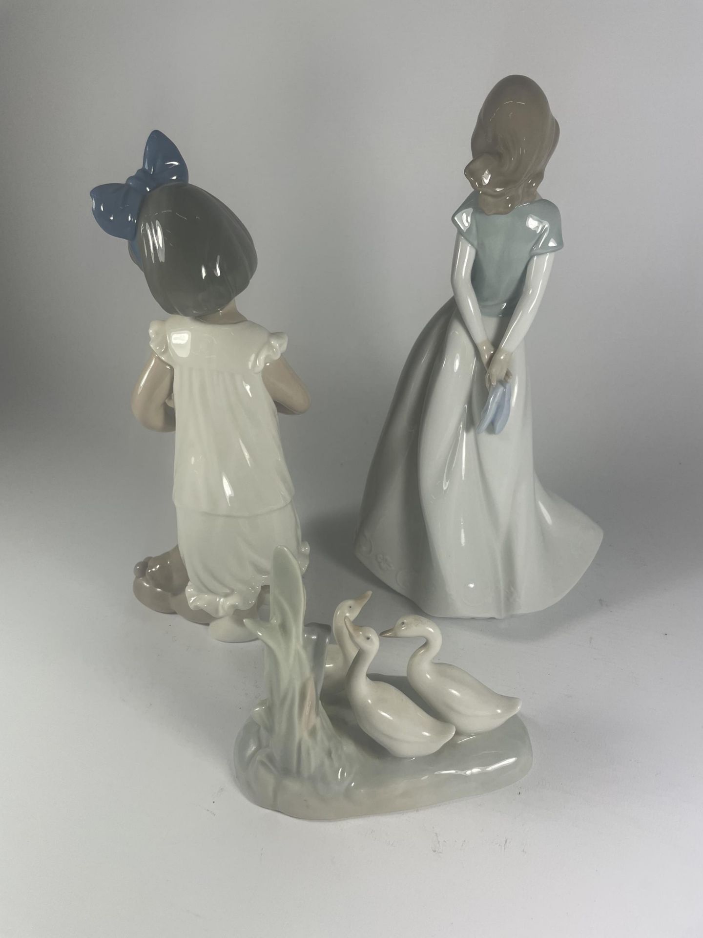 THREE NAO LLADRO FIGURES TO INCLUDE GIRL WITH DOG ETC - Image 5 of 6