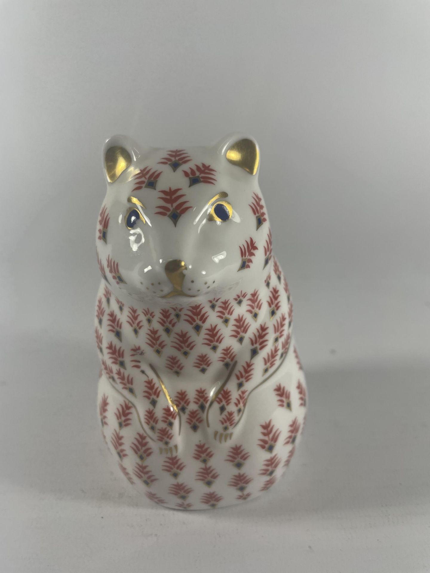 A ROYAL CROWN DERBY HAMSTER PAPERWEIGHT WITH GOLD STOPPER