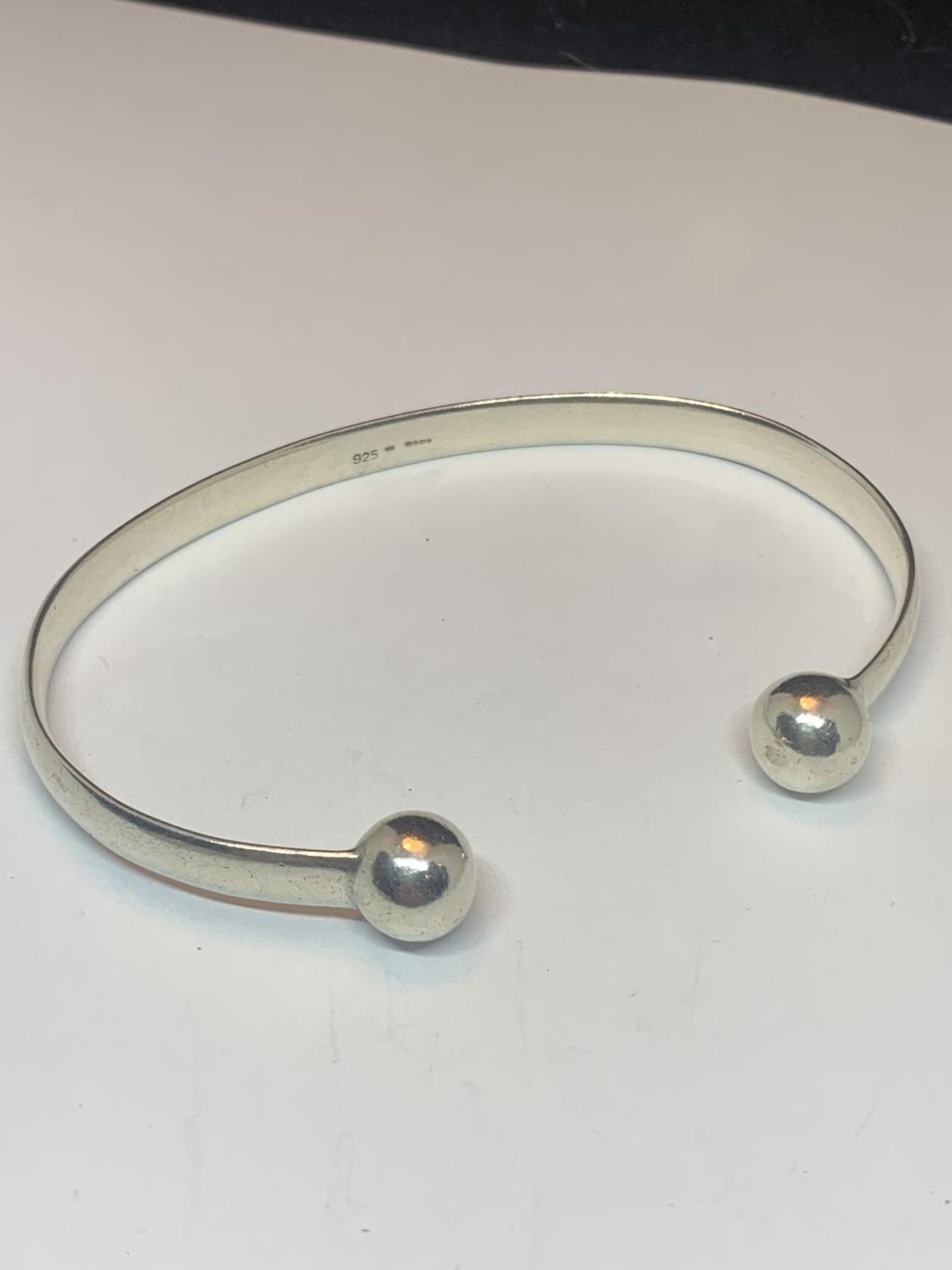 TWO SILVER BANGLES TO INCLUDE A CHILDS WITH CHARMS - Image 3 of 3