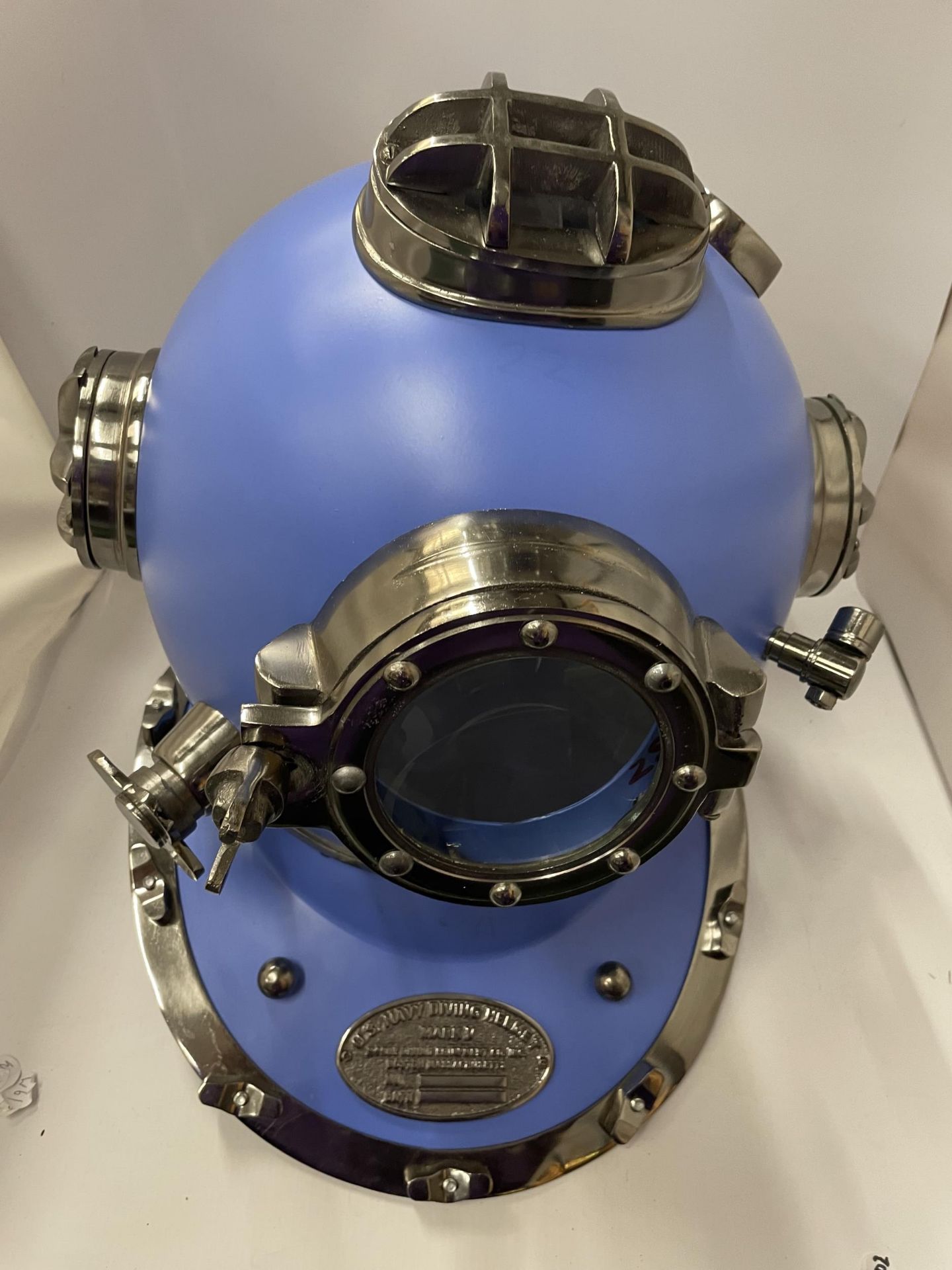 A LARGE BLUE AND CHROME DIVERS HELMET