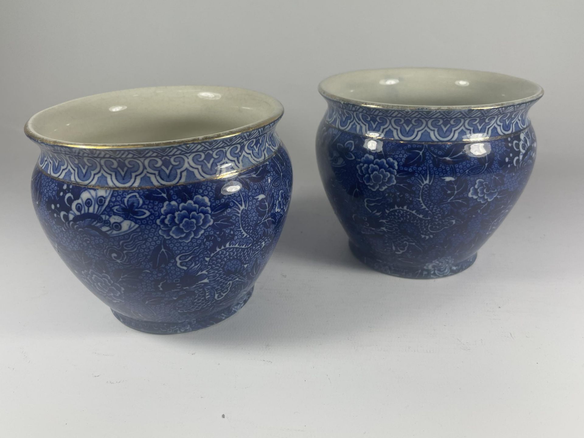 A PAIR OF SHELLEY POTTERY BLUE AND WHITE FLORAL POTS
