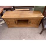 A MODERN OAK TV/ENTERTAINMENT UNIT 55" WIDE