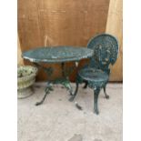 A CAST ALLOY BISTRO SET COMPRISING OF A ROUND TABLE AND ONE CHAIR