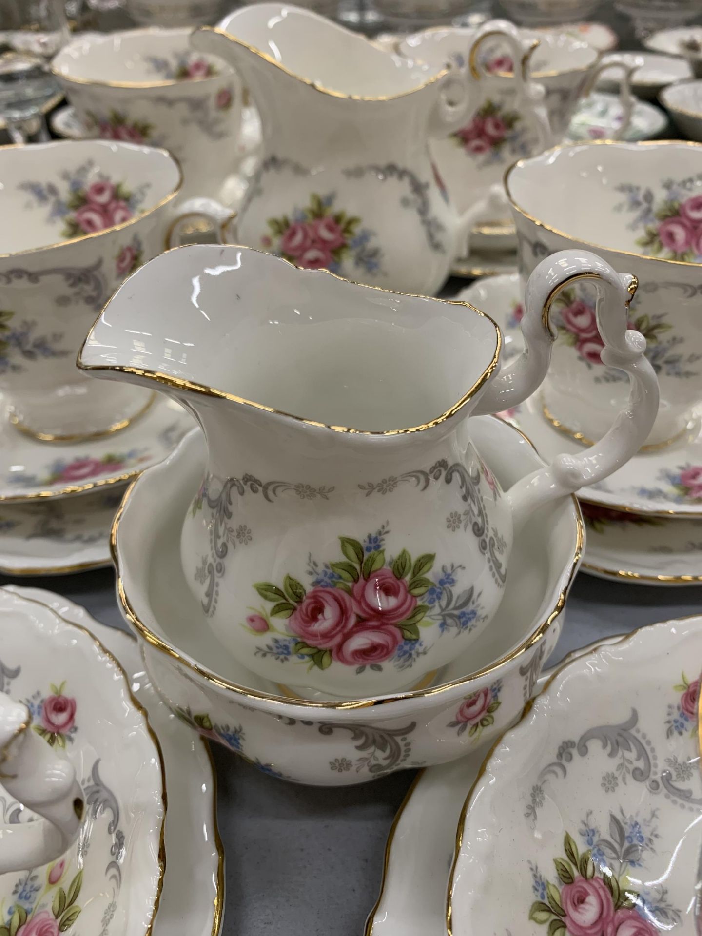 A ROYAL ALBERT 'TRANQUILITY' TEASET TO INCLUDE CUPS, SAUCERS, SIDE PLATES, TWO CREAM JUGS AND A - Image 3 of 5