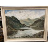 A FRAMED OIL ON CANVAS TITLED 'MOUNTAINS AND ROCKS' SIGNED TO THE BOTTOM LEFT