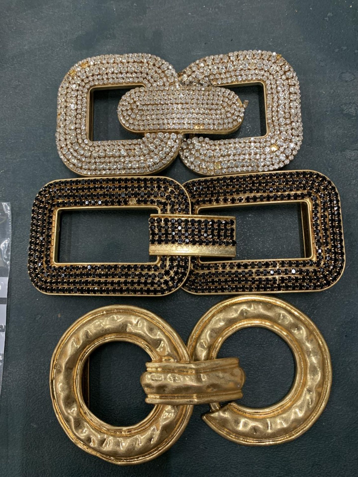 THREE ART DECO STYLE BELT BROOCHES