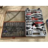 AN ASSORTMENT OF TOOLS TO INCLUDE A TAP AND DIE SET AND SPANNER SET ETC