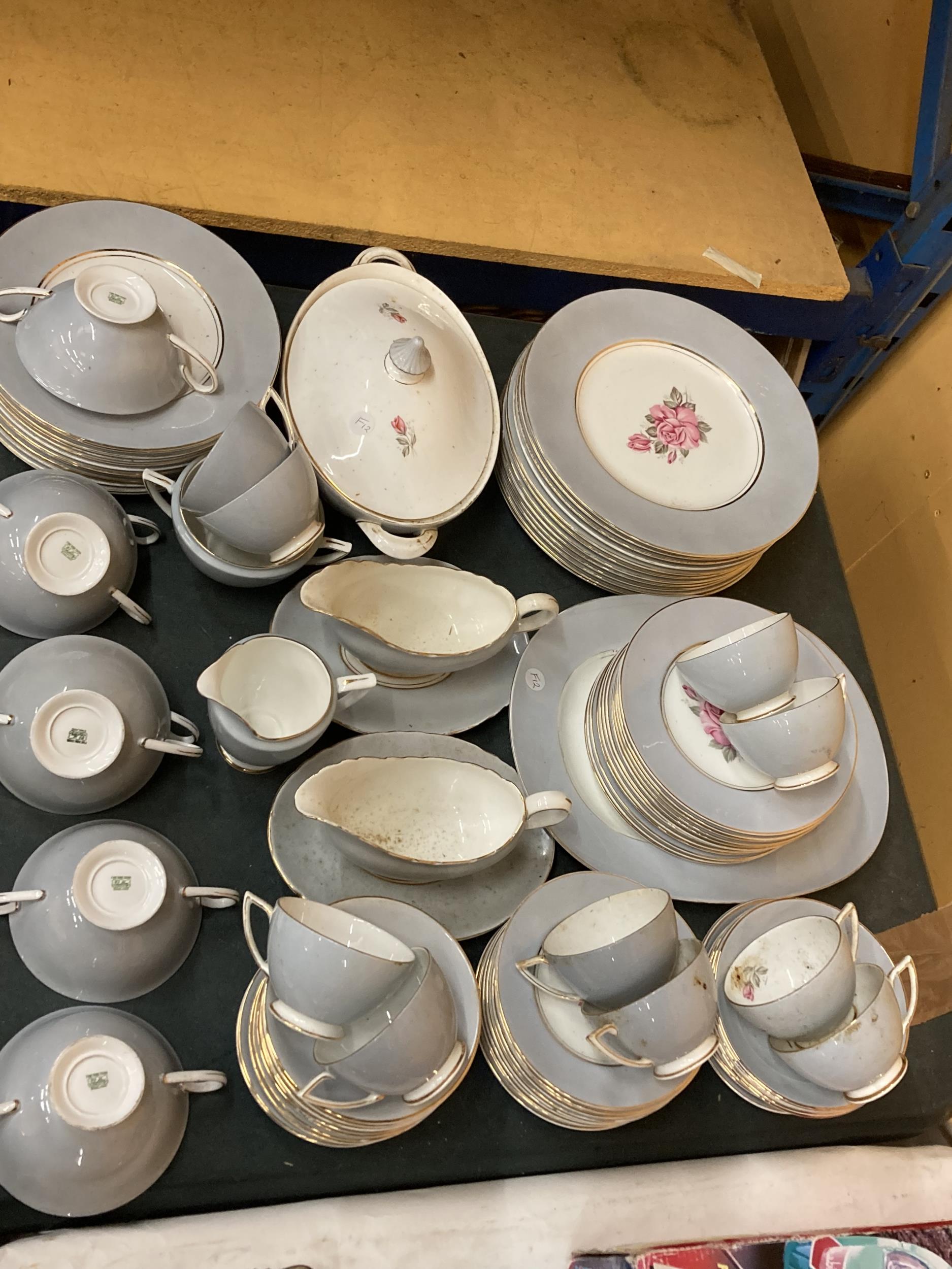 A LARGE QUANTITY OF SHELLEY DINNERWARE IN GREY WITH A PINK ROSE DECORATION TO INCLUDE VARIOUS