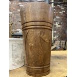 A LARGE HAND CARVED MAHOGANY STICK/UMBRELLA STAND HEIGHT APPROX 47CM