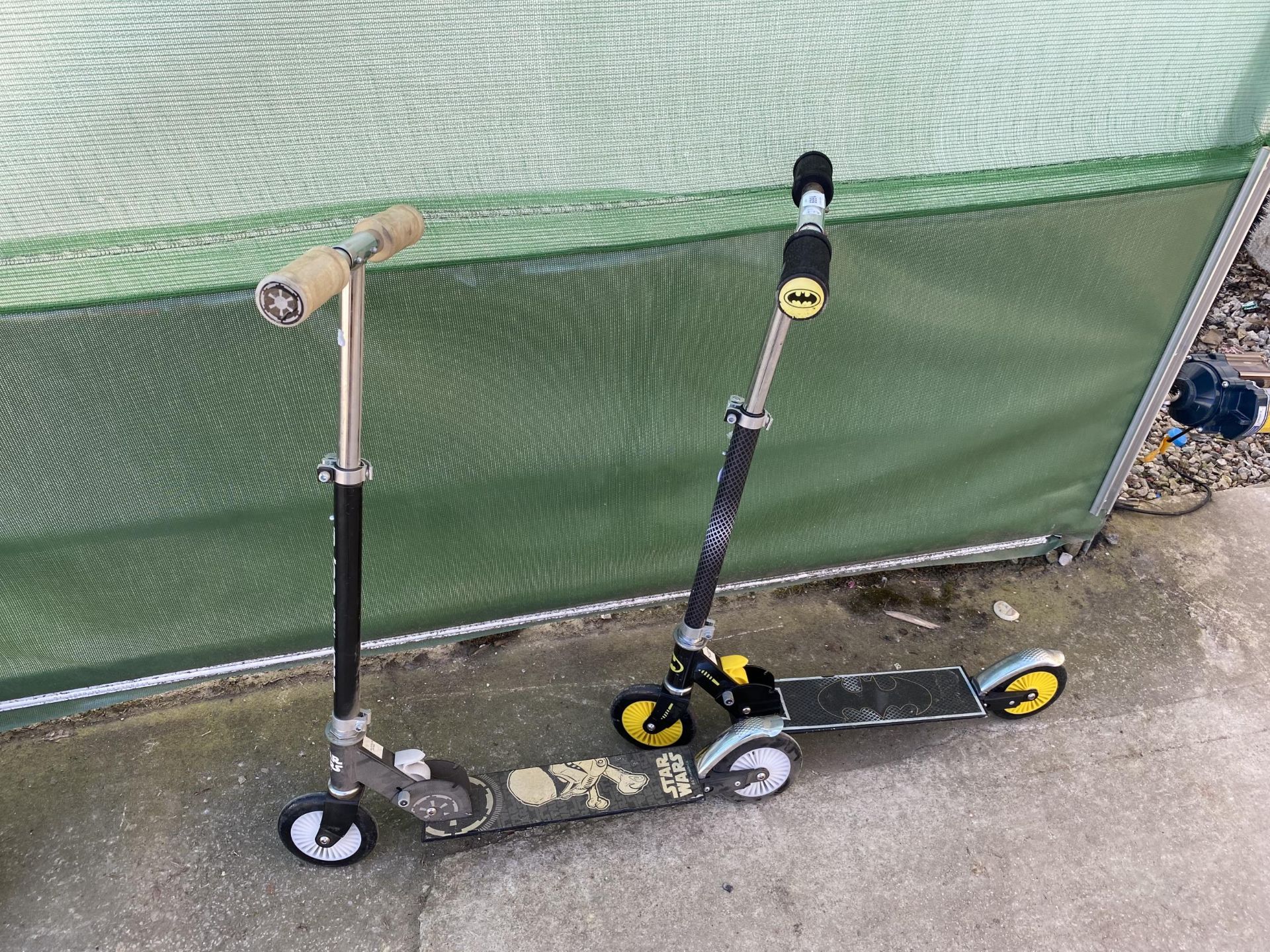 TWO CHILDRENS SCOOTERS TO INCLUDE A BATMAN AND A STAR WARS