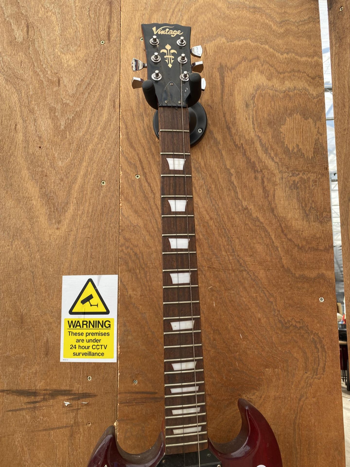 A 'VINTAGE' ELECTRIC GUITAR AND A GUITAR STAND - Image 3 of 3