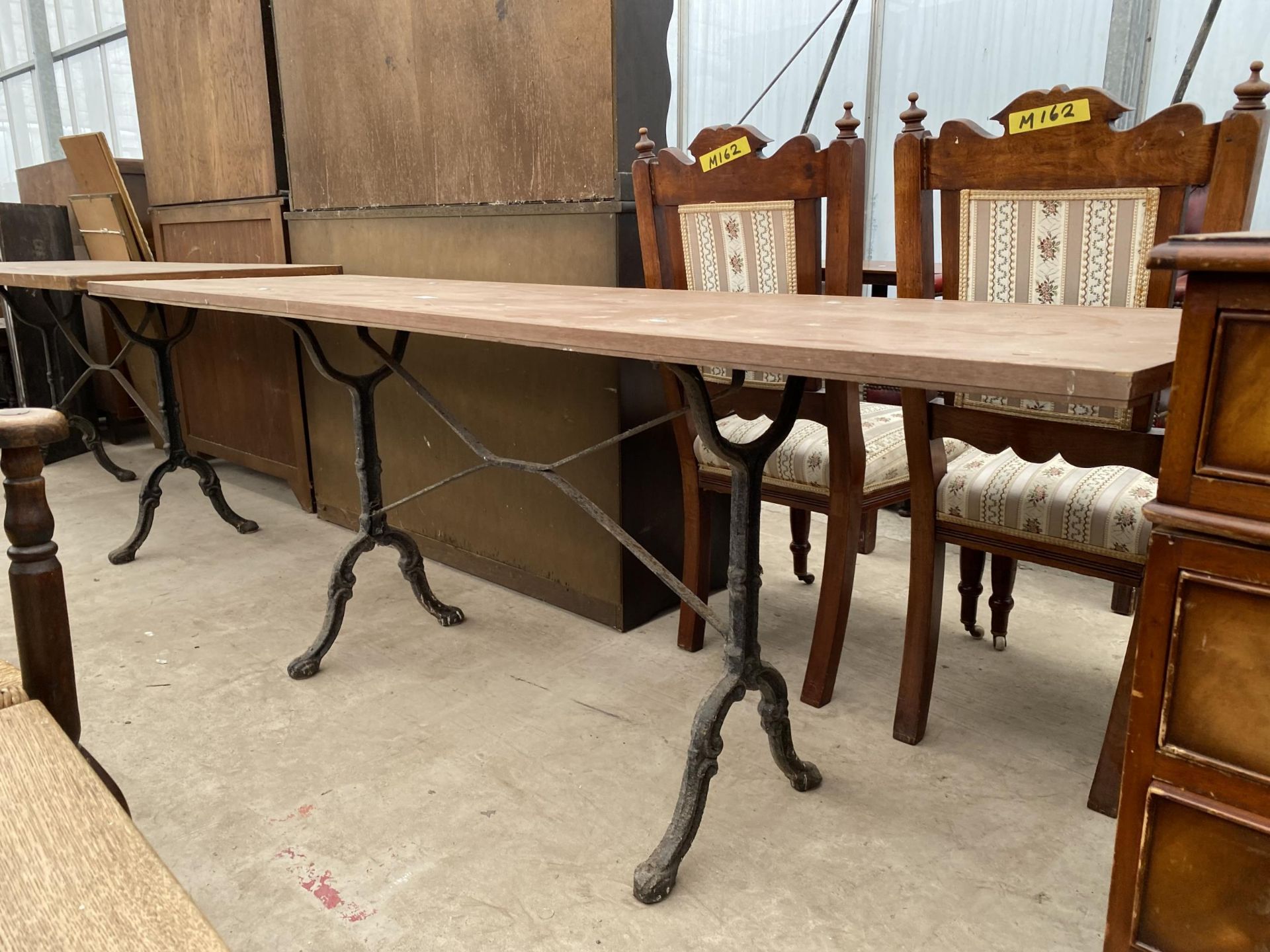 A PUB TABLE ON CAST IRON BASE, 76 X 22" - Image 2 of 3