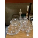 A QUANTITY OF GLASSWARE TO INCLUDE CUT GLASS BOWLS, BRANDY BALLOONS, WHITE GLASS VASE, ETC