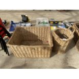 A WICKER LOG BASKET AND A FURTHER WICKER STICK STAND