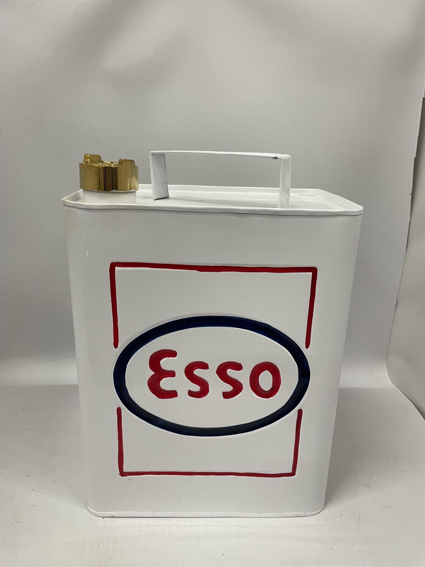 A WHITE ESSO PETROL CAN WITH BRASS TOP