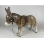 A SYLVAC DONKEY FIGURE WITH LEATHER REIGNS