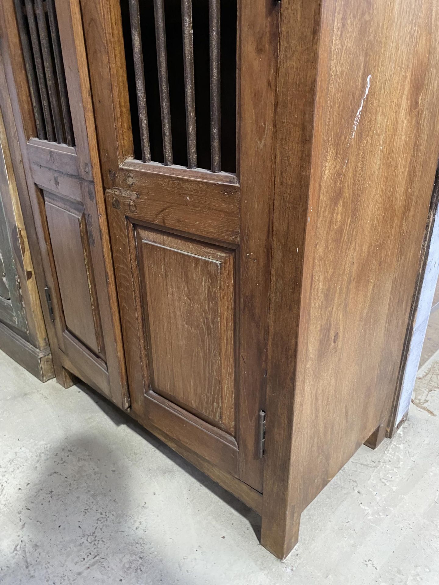 A VINTAGE INDIAN HARDWOOD OPENWORK TWO DOOR CABINET WITH BRASS HASP + IRON BAR, 35" WIDE - Image 3 of 3