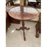 A 19TH CENTURY MAHOGANY DISH TOP TABLE ON AN ELM TRIPOD BASE 21" DIAMETER