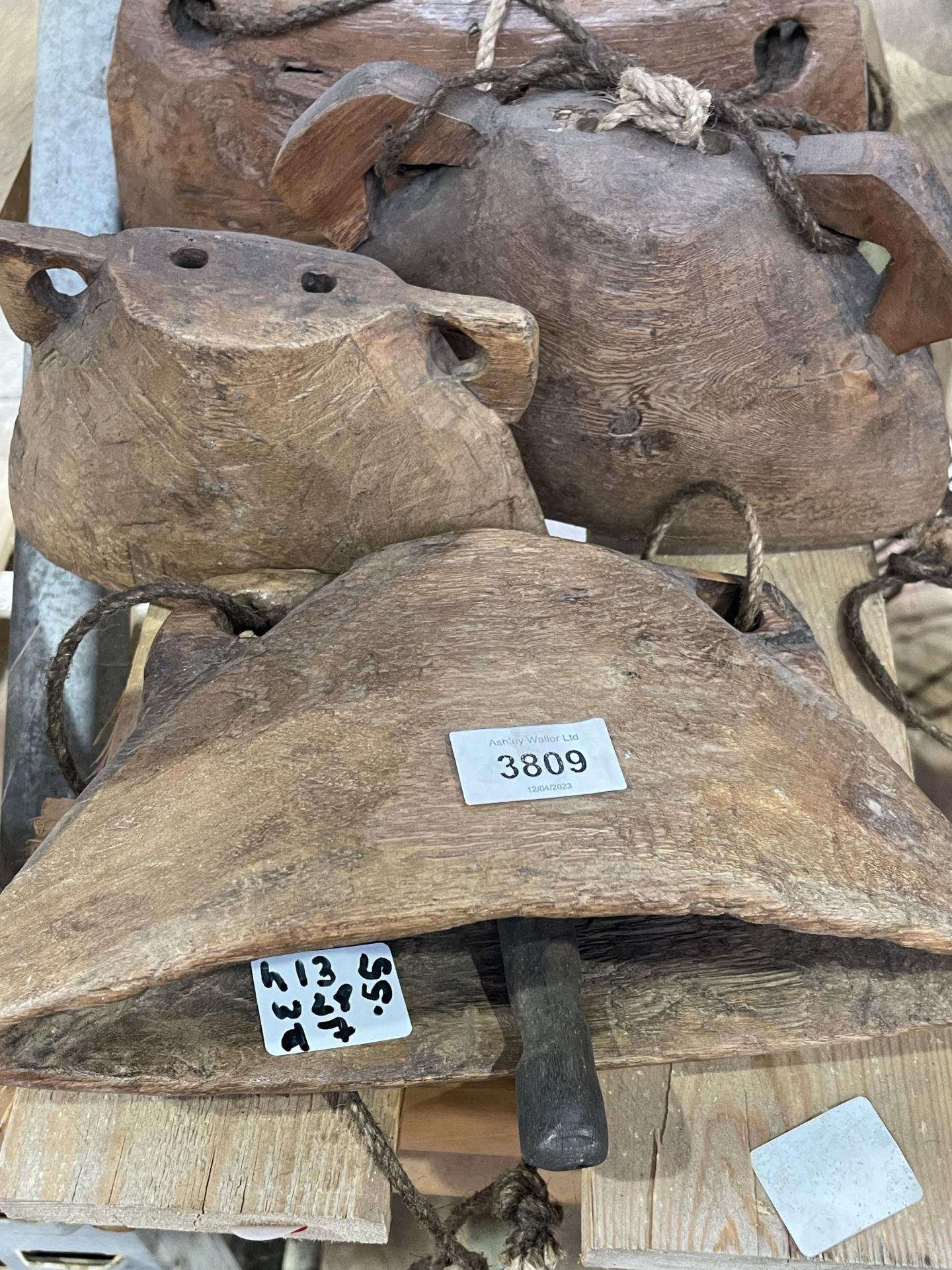 A GROUP OF INDIAN HARDWOOD WALL HANGING POCKETS