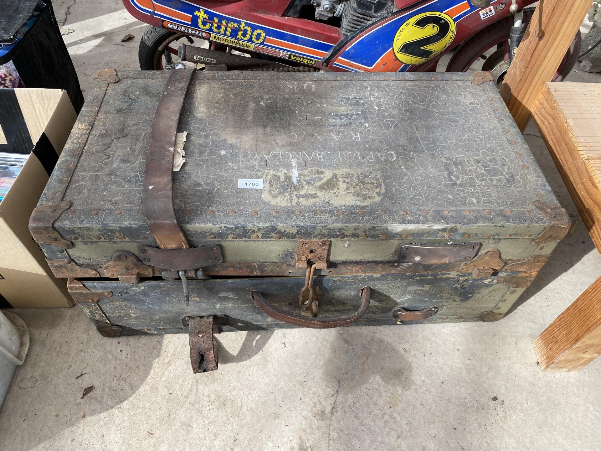 A VINTAGE MILITARY TRAVEL TRUNK
