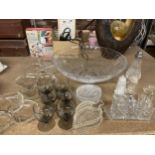 A QUANTITY OF GLASSWARE TO INCLUDE CRUET SET, GLASSES, LARGE BOWL, NIBBLE DISHES, ETC.,