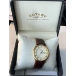 A ROTARY CALENDAR WRISTWATCH IN A PRESENTATION BOX SEEN WORKING BUT NO WARRANTY