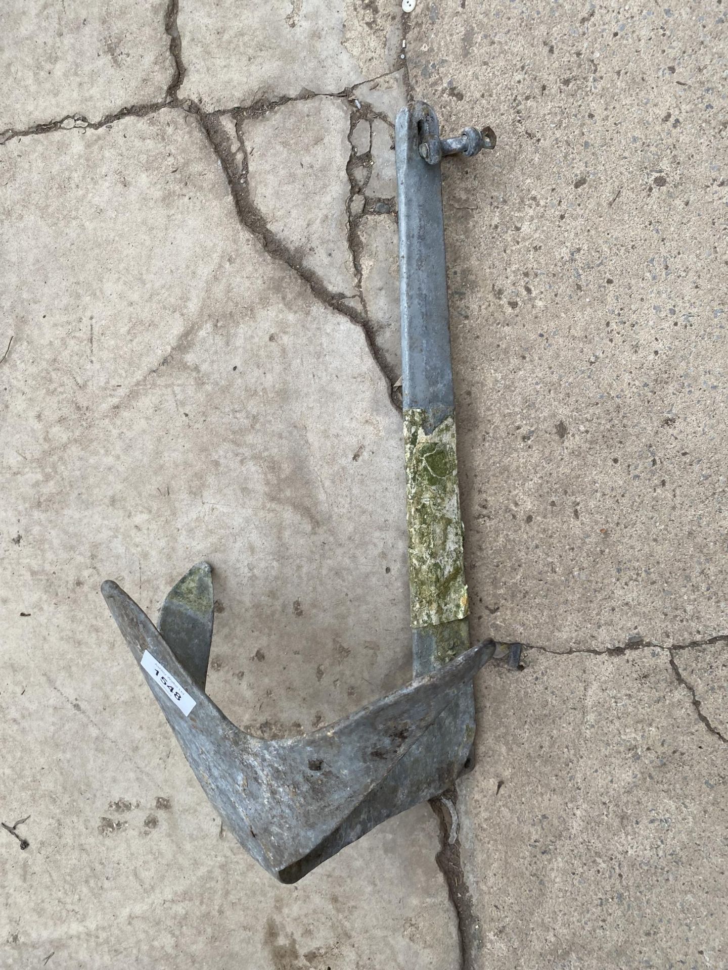 A METAL BOAT ANCHOR