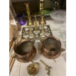 A QUANTITY OF BRASS AND COPPER TO INCLUDE CANDLESTICKS, PAN STAND, TWIN HANDLED FOOTED PLANTERS,