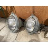 A PAIR OF VINTAGE INDUSTRIAL LIGHT FITTINGS WITH GLASS DOME SHADES