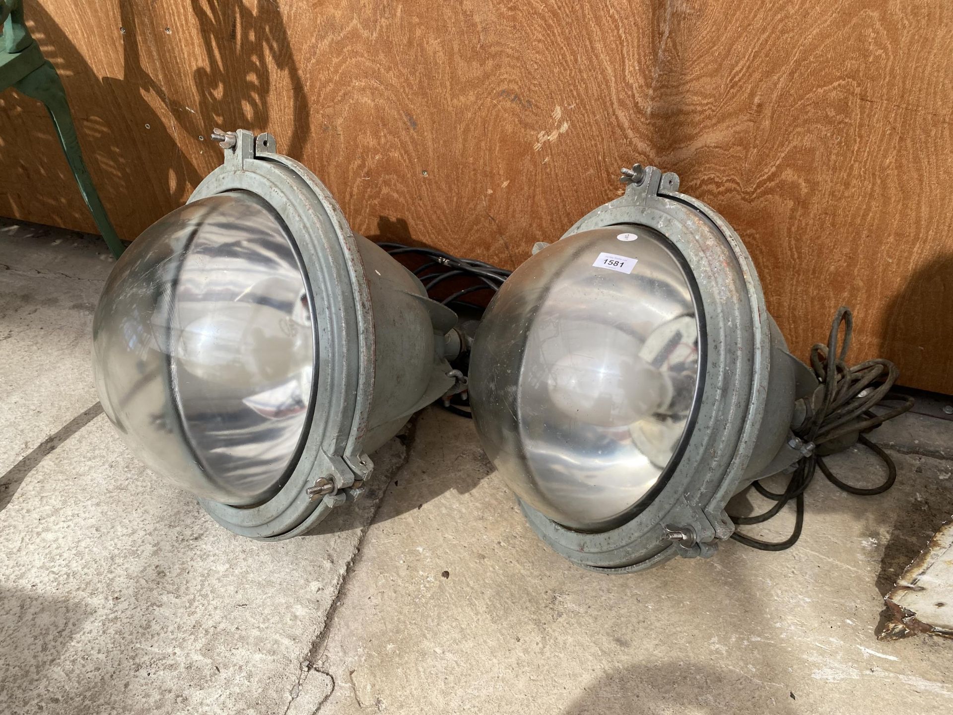 A PAIR OF VINTAGE INDUSTRIAL LIGHT FITTINGS WITH GLASS DOME SHADES