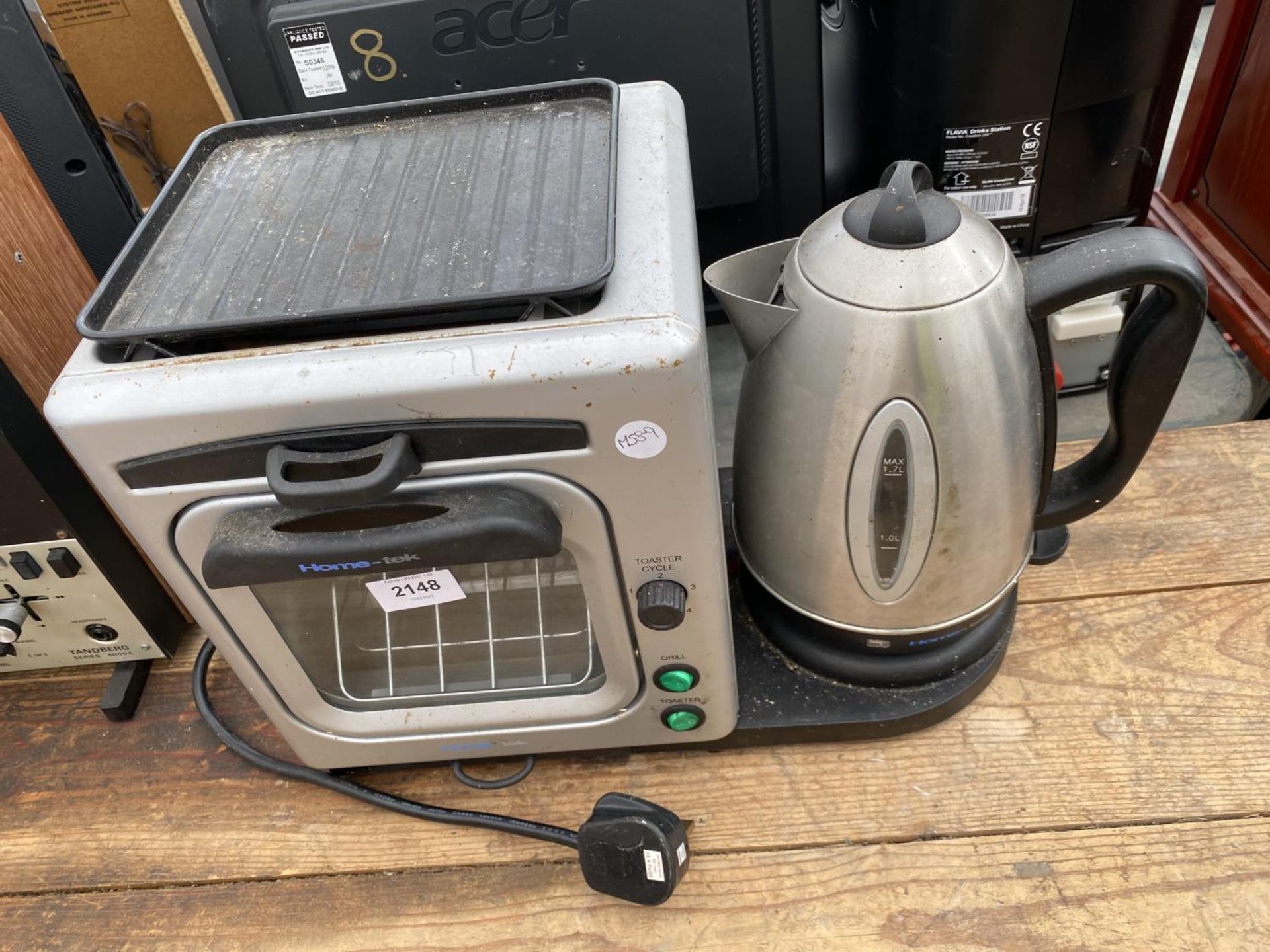 A HOME-TEK GRILL AND KETTLE