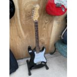 A BLACK SQUIRE STRATOCASTER BY FENDER ELECTRIC GUITAR (SERIAL NUMBER: N006099)