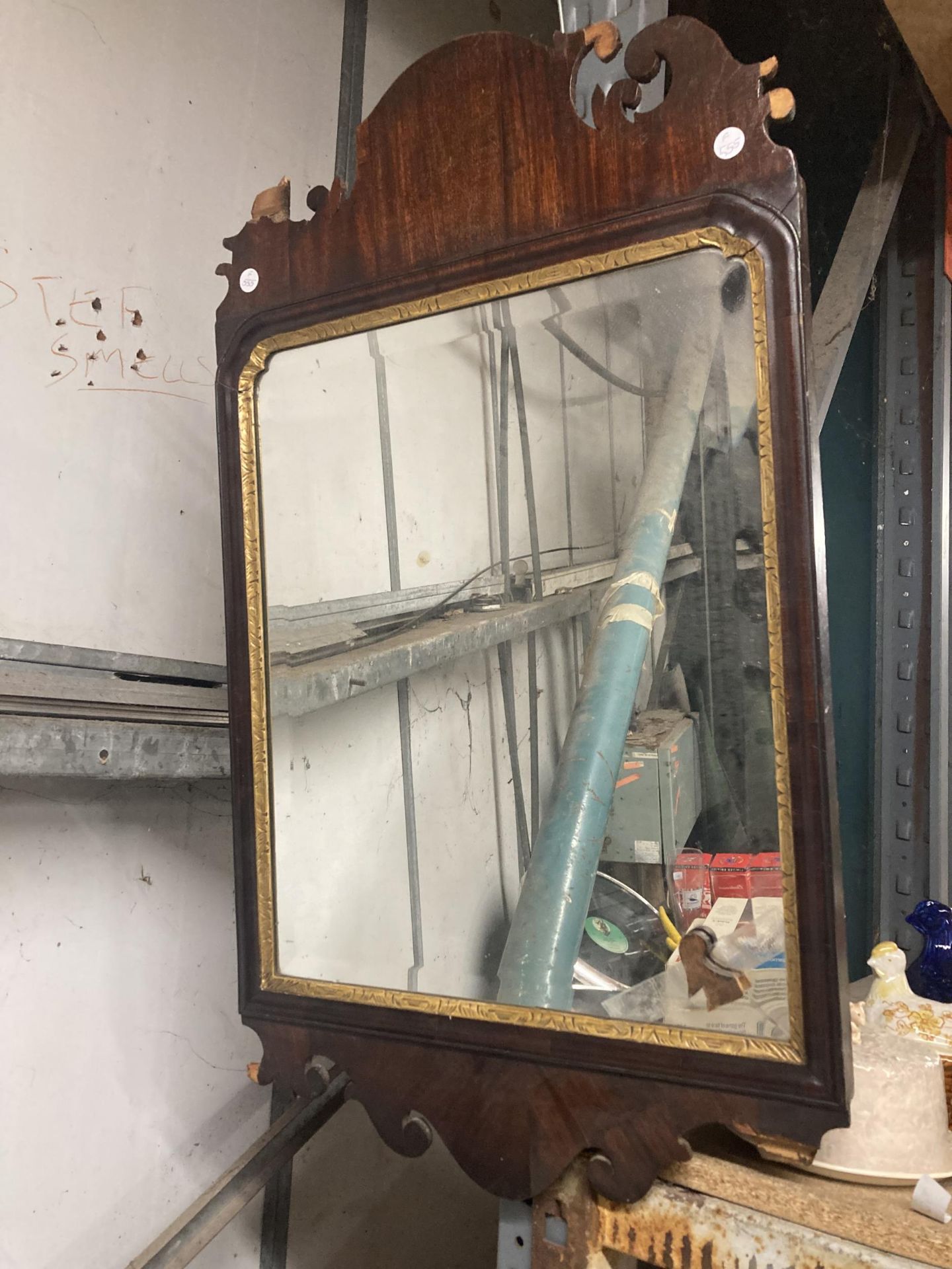 A VINTAGE MAHOGANY FRAMED MIRROR - A/F